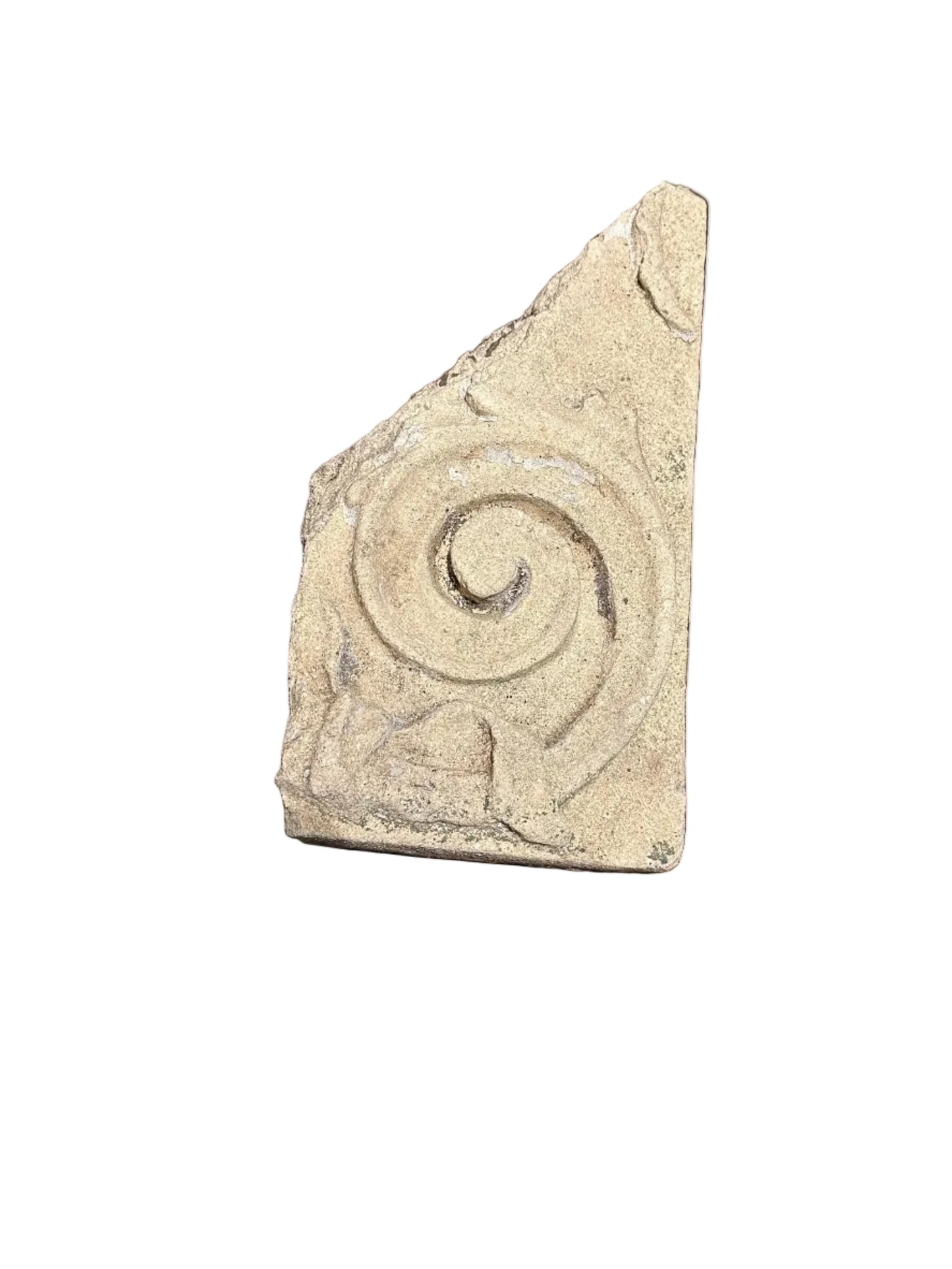 Small vintage concrete fragment, triangular piece carved with a spiral scroll, distressed surface