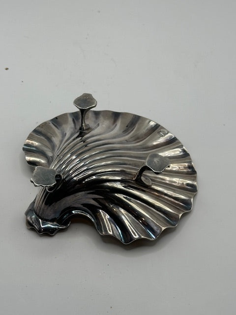 Vintage silver plate shell dish, angled view of the ribbed scallop underside