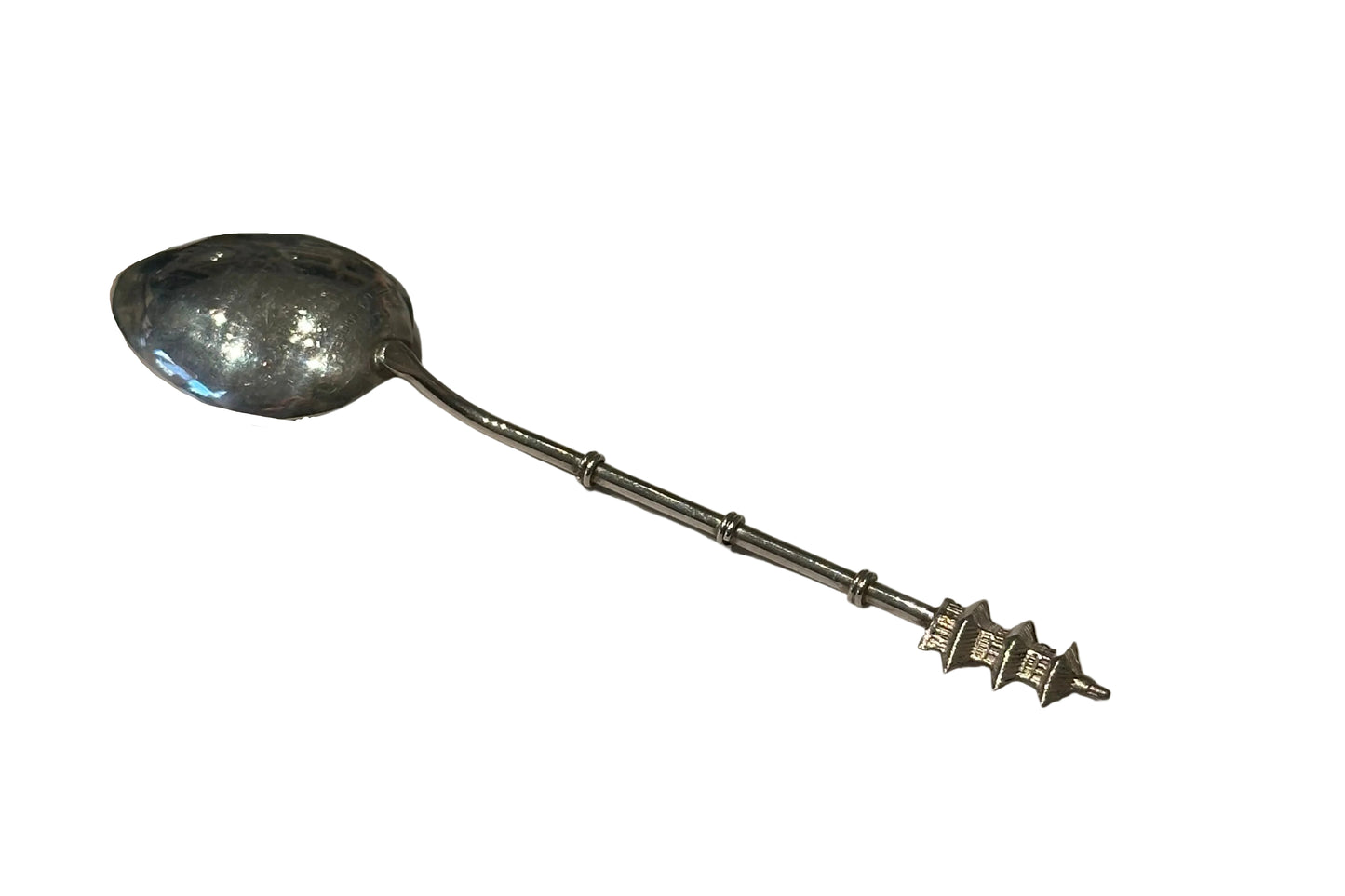Sterling silver pagoda demitasse spoon, diagonal full view of the bamboo-segment handle and pagoda finial.