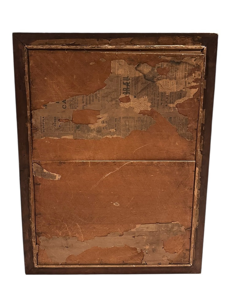 Back of the antique Mary painting's wood frame, showing aged backing board with old newspaper fragments