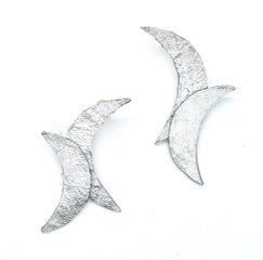 Artisan recycled leather earrings, silver-wash crescent moon shape, pair shown.