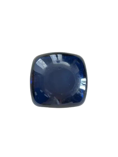 Underside of the blue Murano dish showing its rounded dark navy base.