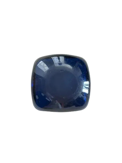 Underside of the blue Murano dish showing its rounded dark navy base.