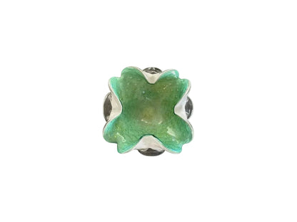 Murano style handblown glass dish in vibrant green with scalloped clover form, viewed from the front