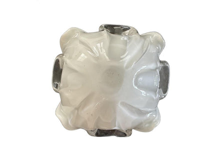 Underside of Murano glass dish showing clear white ruffled scalloped base