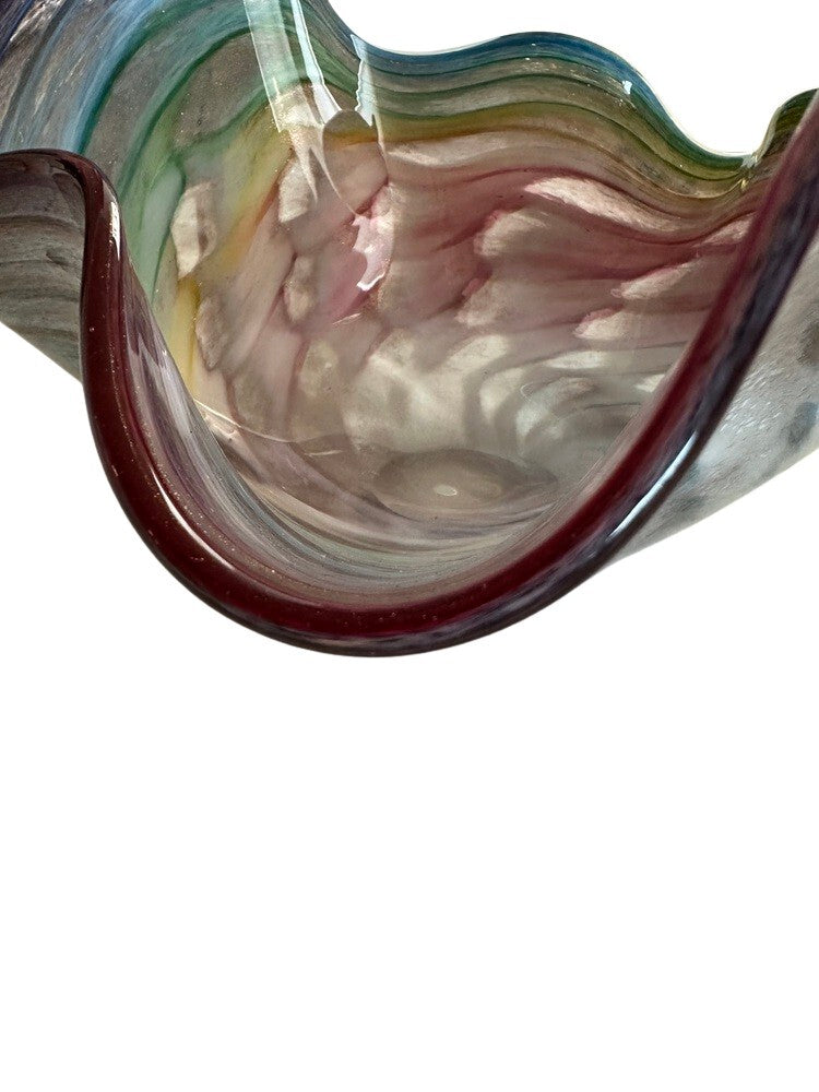 Close-up of the interior rim of the Murano style rainbow handblown glass bowl