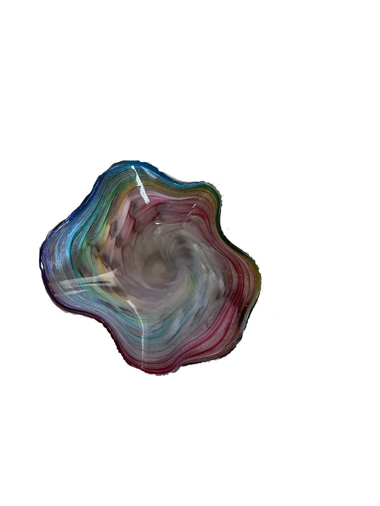 Murano style handblown glass bowl, top-down view of rainbow swirl with light glare