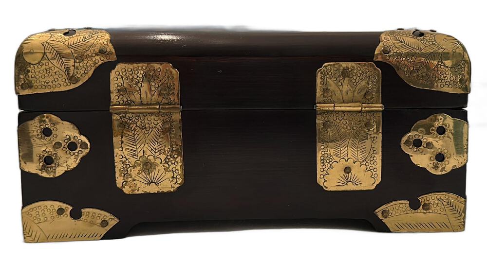 Rear view of the Asian wood box showing engraved brass mounts and lid hinges