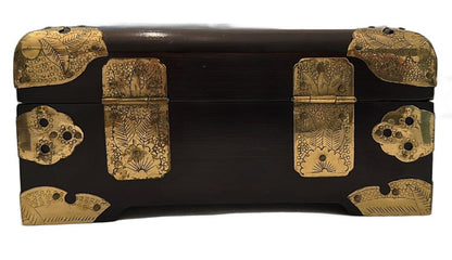 Rear view of the Asian wood box showing engraved brass mounts and lid hinges