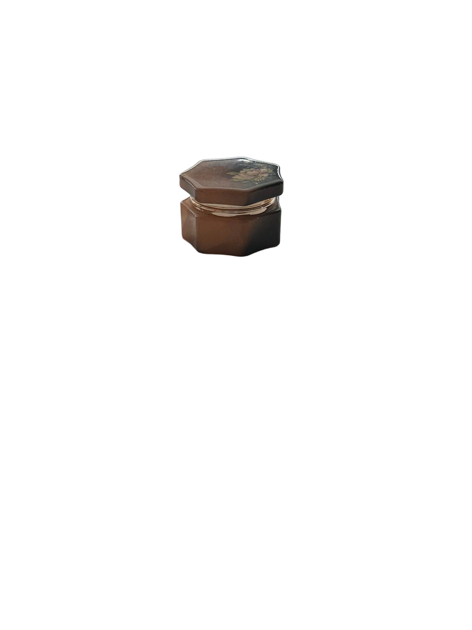 Vintage brown alabaster petite hinged box, closed, octagonal form with gilt rim, three-quarter view.