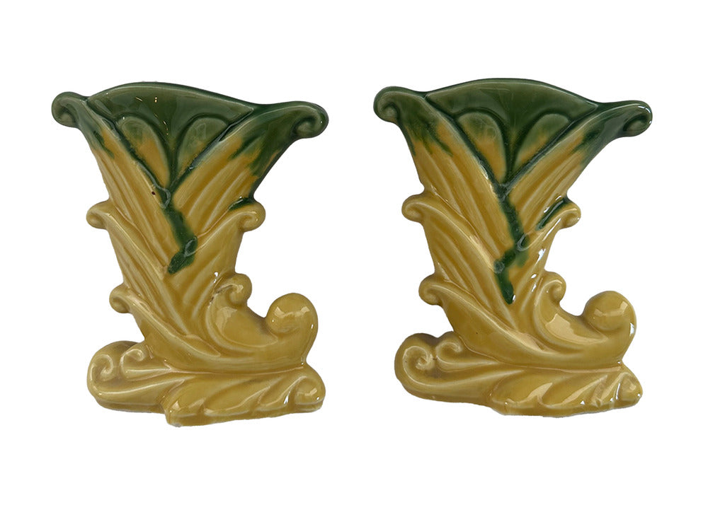 Pair of vintage Shawnee Pottery cornucopia vases, green-rimmed trumpet openings and yellow leaf-scroll bodies