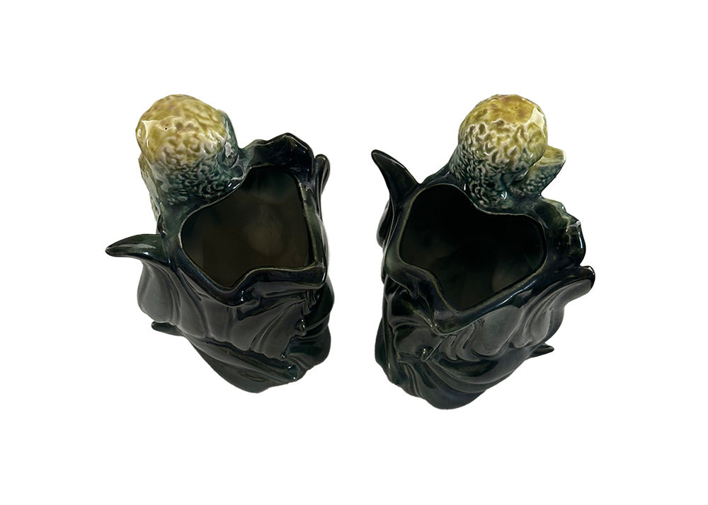 Pair of vintage Hull poodle vases from above, dark interior cavities of the leaf-form vessels with poodle heads