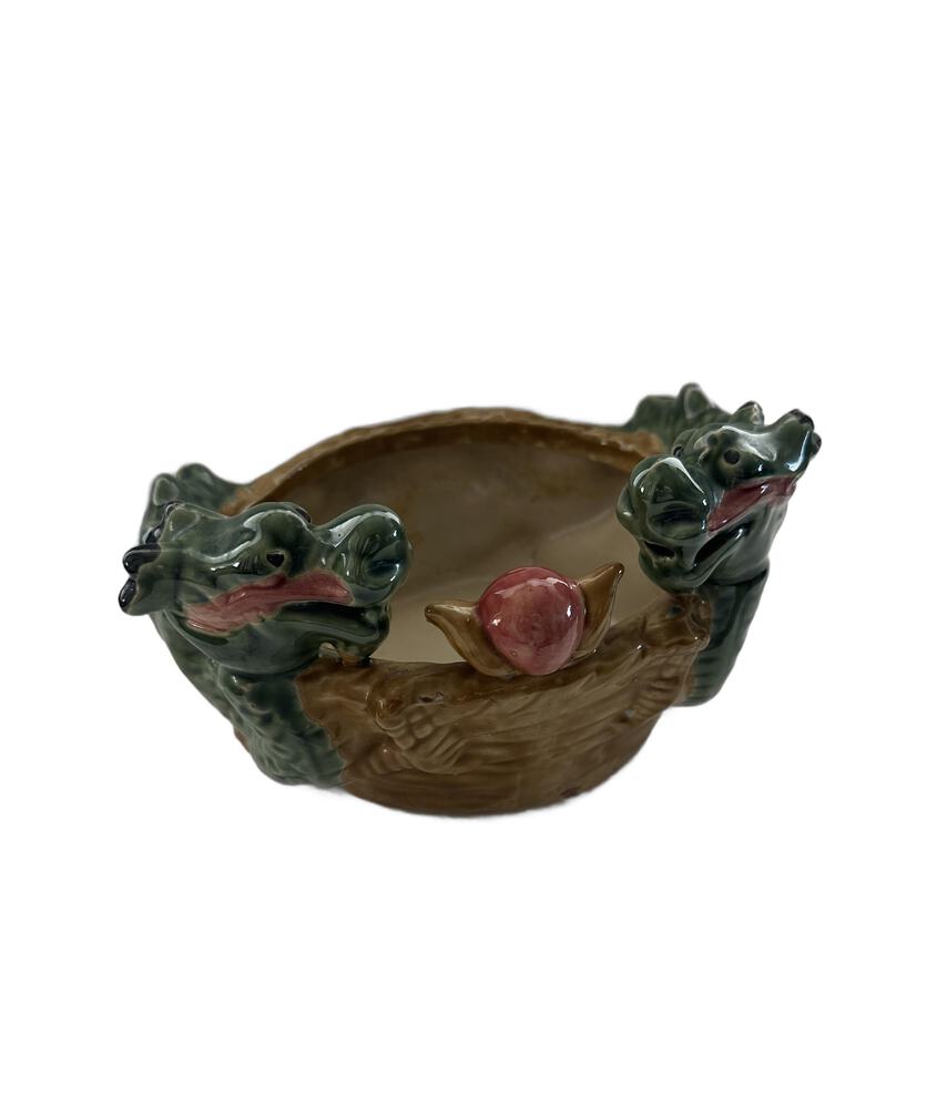 Ceramic double dragon planter, three-quarter view with green dragon heads and central pink pearl