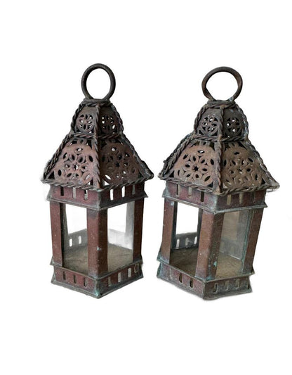 Vintage copper lanterns, two small lanterns side by side, front view with brown copper patina