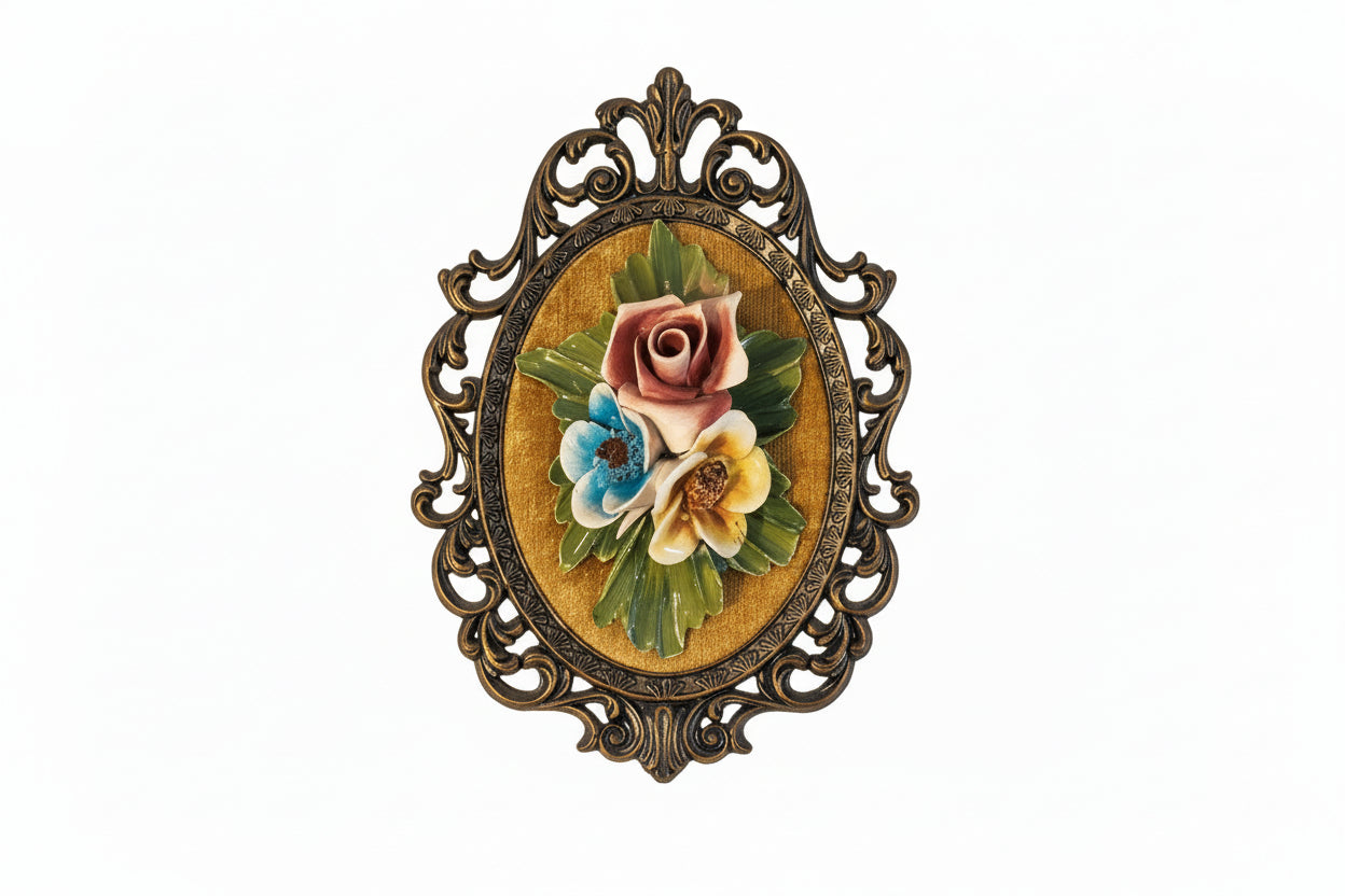 Vintage Capodimonte-style porcelain floral wall plaque, pink rose with blue and yellow blooms on gold velvet in ornate frame