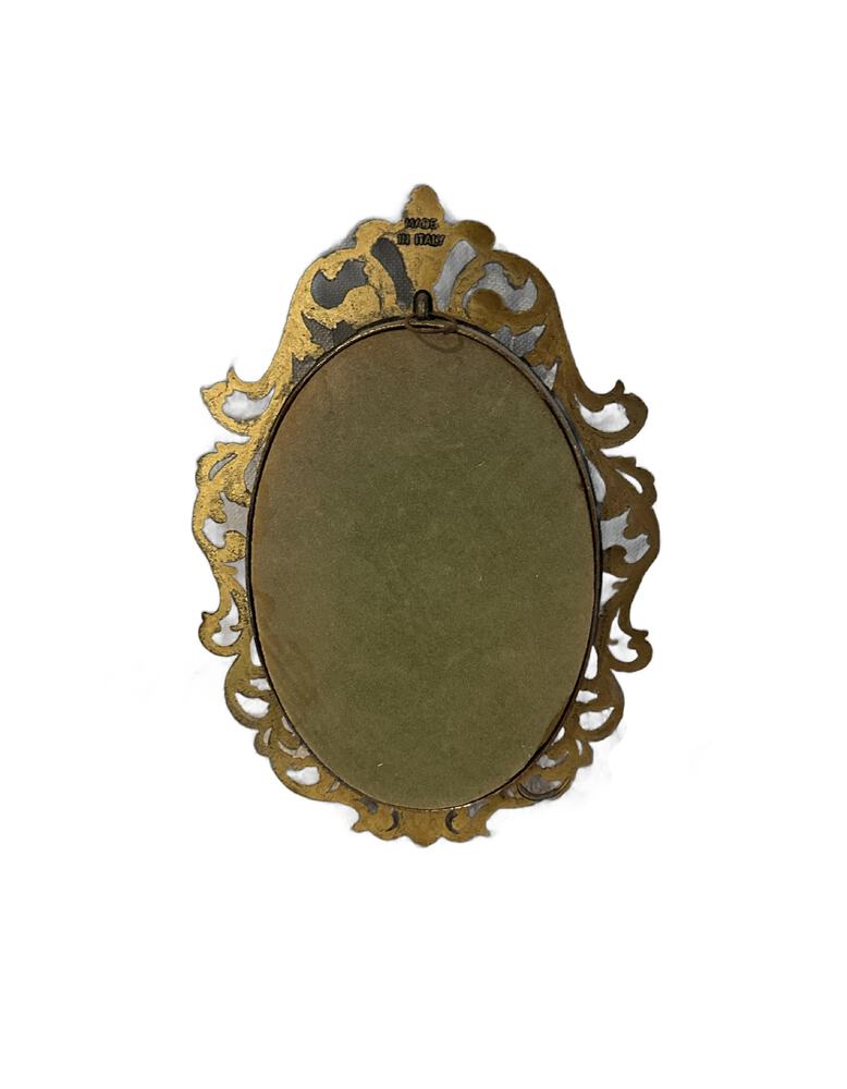 Back of Capodimonte plaque showing gilt openwork frame, wire hanging loop and 'Made in Italy' stamp