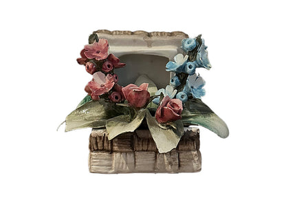 Capodimonte porcelain floral arrangement, front view, pink and blue hand-painted flowers with green leaves