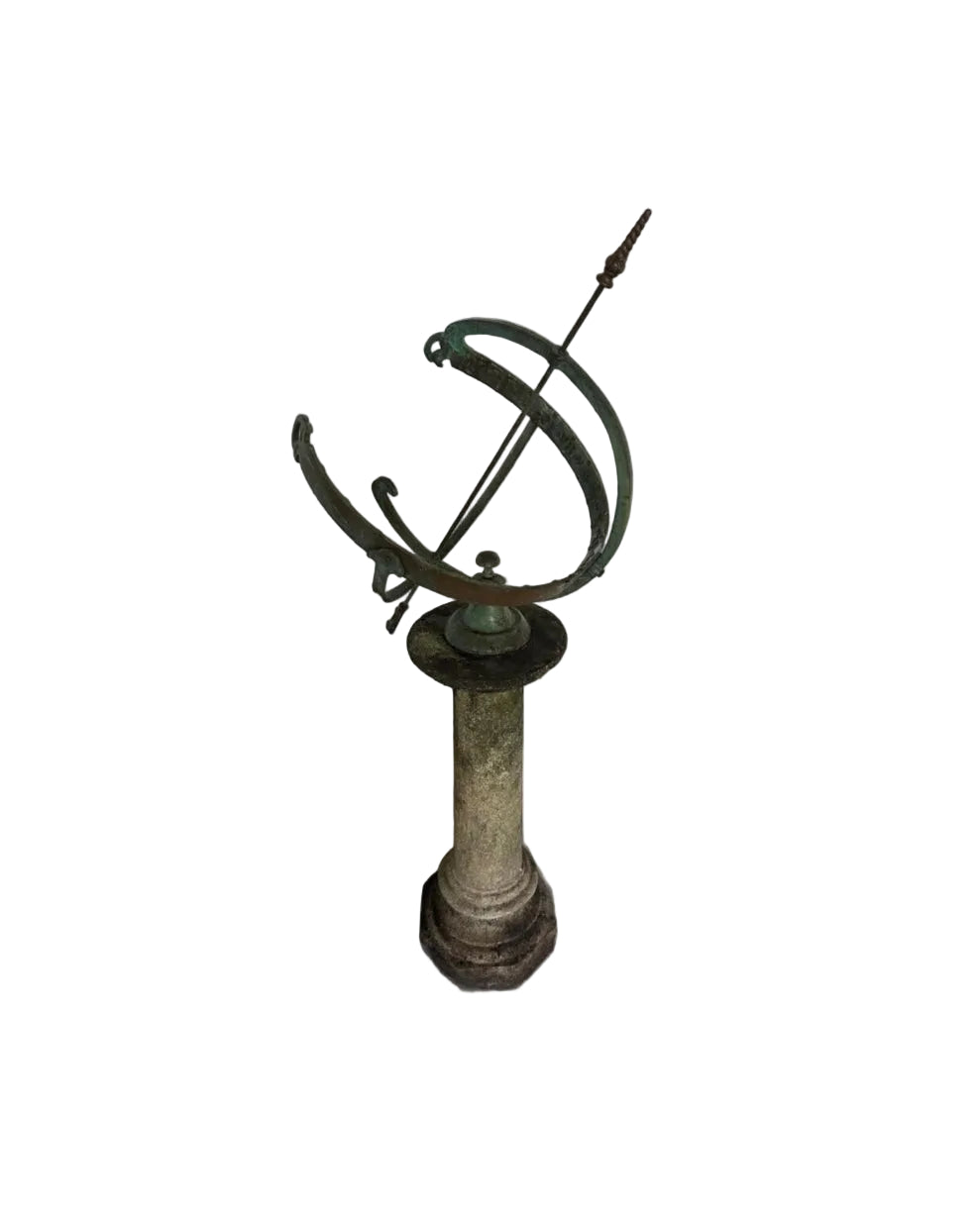 Verdigris bronze armillary sundial on a stone column pedestal, full view from a slightly different angle