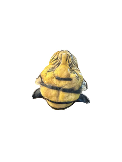 Vintage ceramic tiger head wall hanging viewed from below showing chin and underside