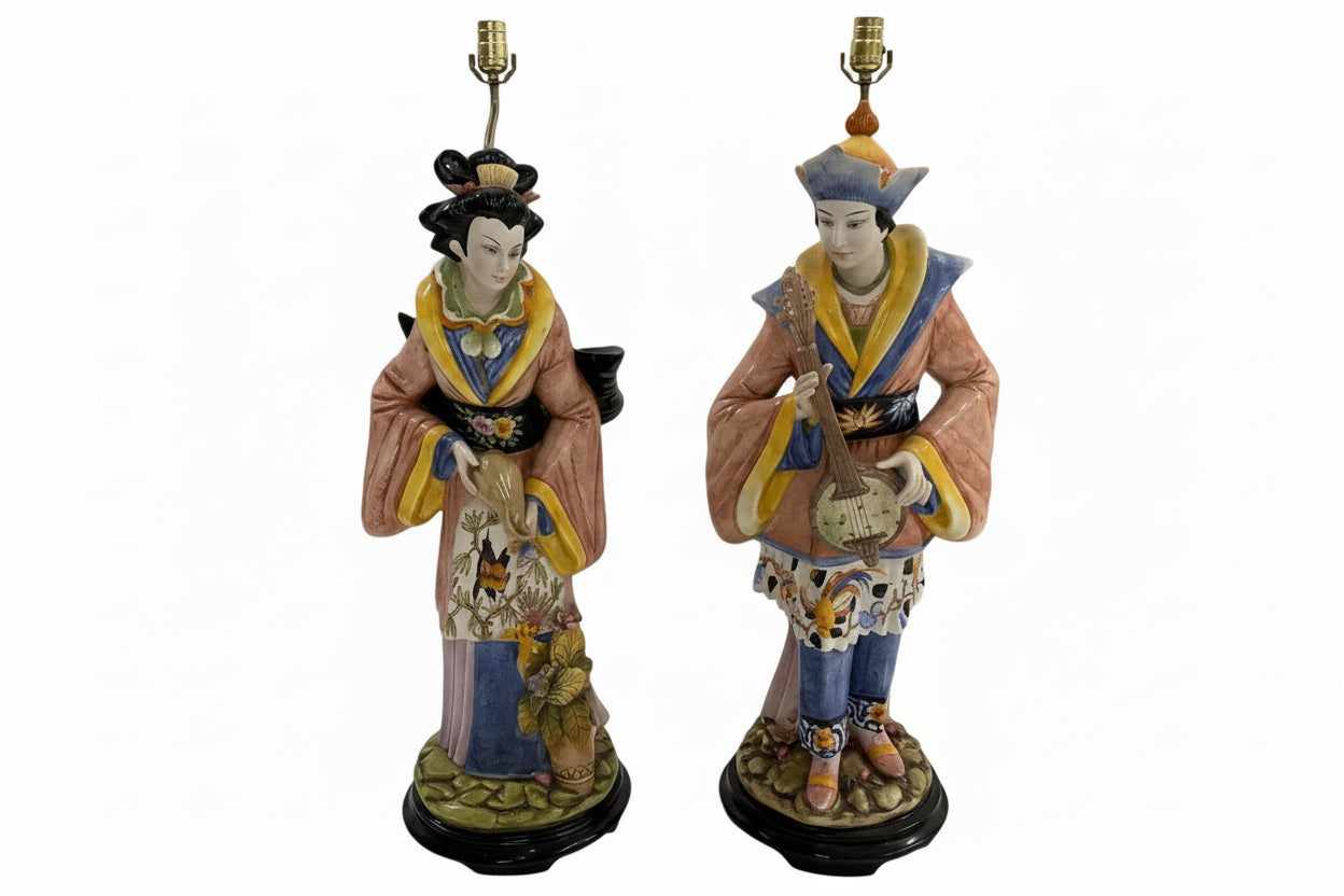 Pair of Italian Capodimonte figural lamps, porcelain man and woman in Asiatic costume, front view