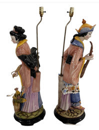 Pair of Capodimonte figural lamps, side view of robed porcelain figures