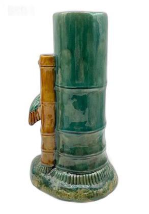 Majolica heron and bamboo vase, rear view of green bamboo trunk and glazed base