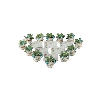 Full set of porcelain place card holders, turquoise birds among green leaves on white scalloped bases