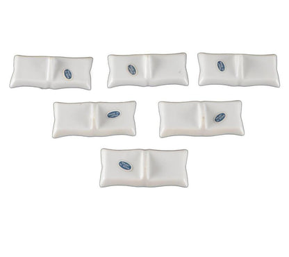 Undersides of six place card holders, pillow-shaped bases with blue 'Made in Japan' maker's marks