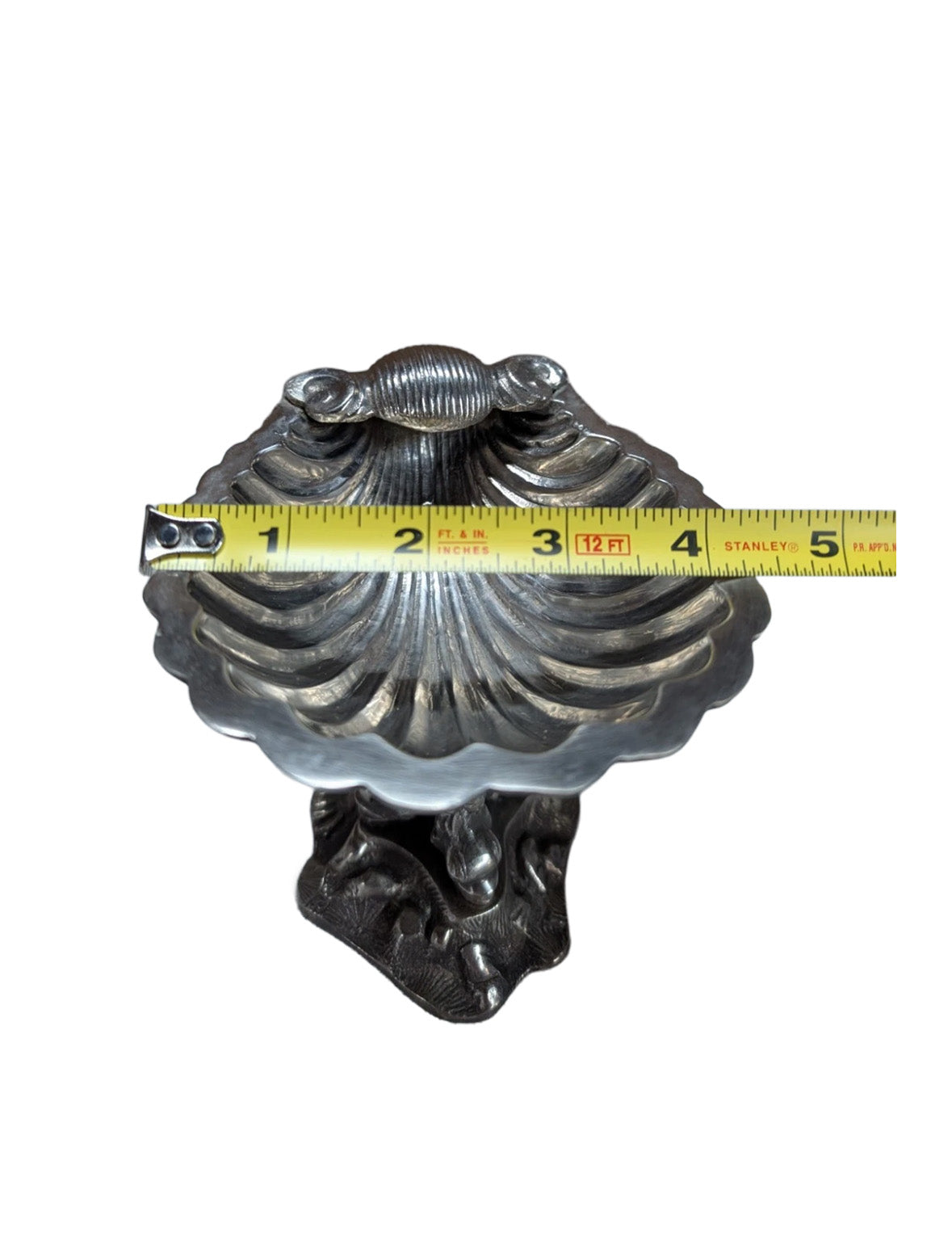 Victorian silver plate caviar dish beside a tape measure showing roughly 5 inch height