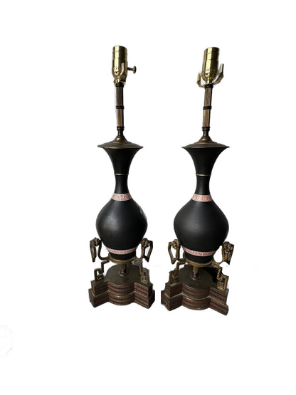 Pair of neoclassical black lamps from the side, red Greek-key bands and stepped gilt-bronze bases