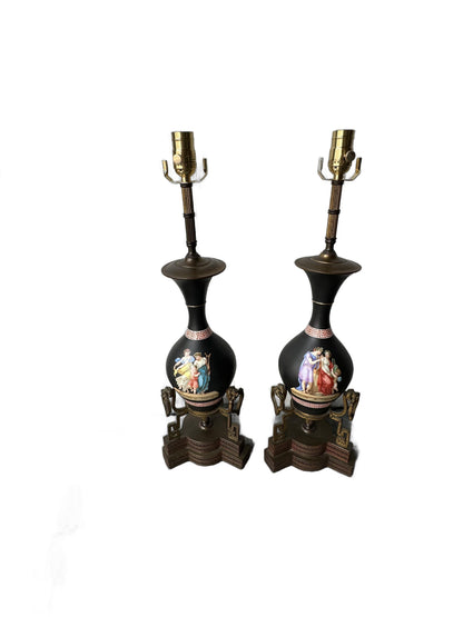 Pair of black neoclassical porcelain lamps shown full length against white