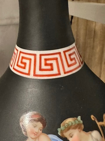 Close-up of the lamp neck, red-and-white Greek-key band above the painted figural scene