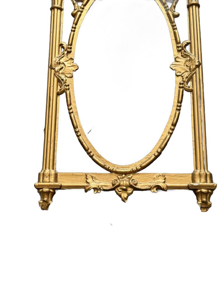 Vintage carved giltwood frame, lower section with oval opening and carved bottom cartouche