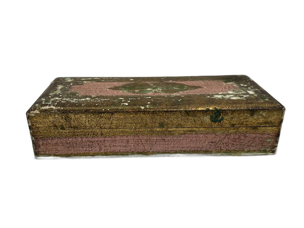 Florentine gilt-wood hinged box, angled view of worn gold-and-pink lid with crackled, distressed finish
