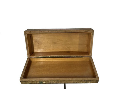 Florentine hinged box open with lid raised, showing bare wood interior and distressed gilt outer edges