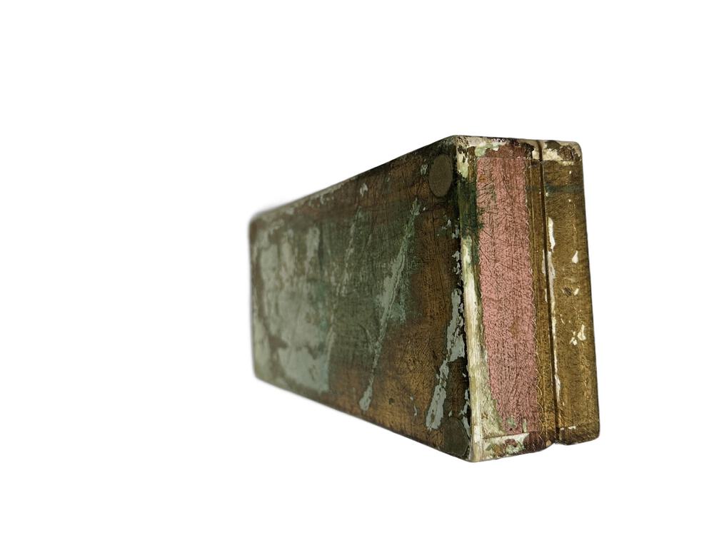 End profile of closed Florentine hinged box, distressed gold-leaf top over worn pink-painted band