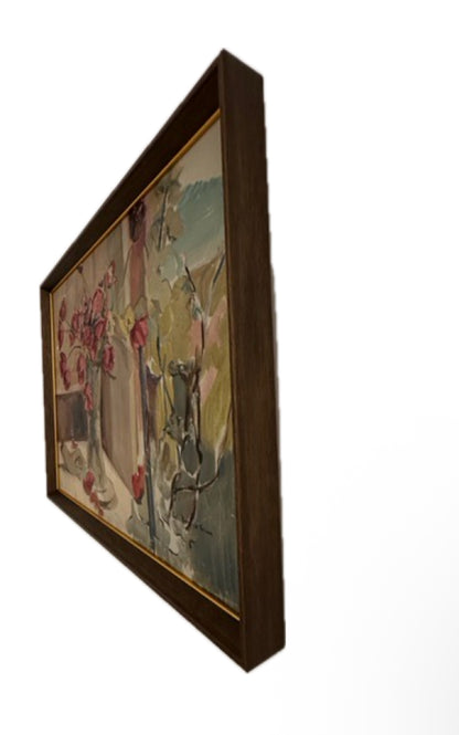 Side profile of the framed tulip painting showing the depth of its wood frame.