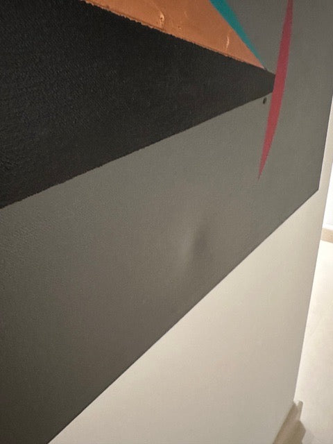 Large vintage post-modern painting, angled edge view of canvas with black triangle on gray