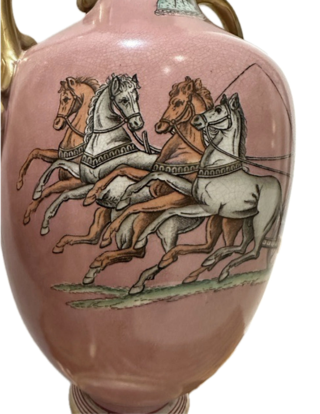 Close-up of the hand-painted four-horse chariot scene on a pink ceramic lamp body