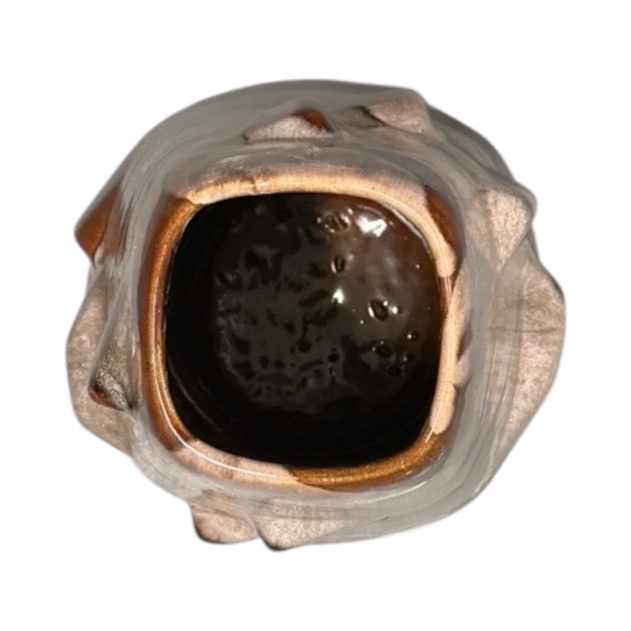 Top-down view into the MCM vase's mouth, square glossy dark-brown interior framed by a cream rim.