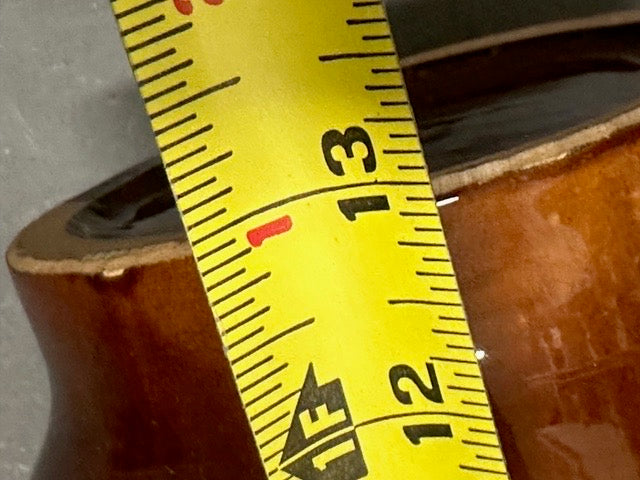 MCM vase body beside a tape measure indicating roughly 12 to 13 inches.