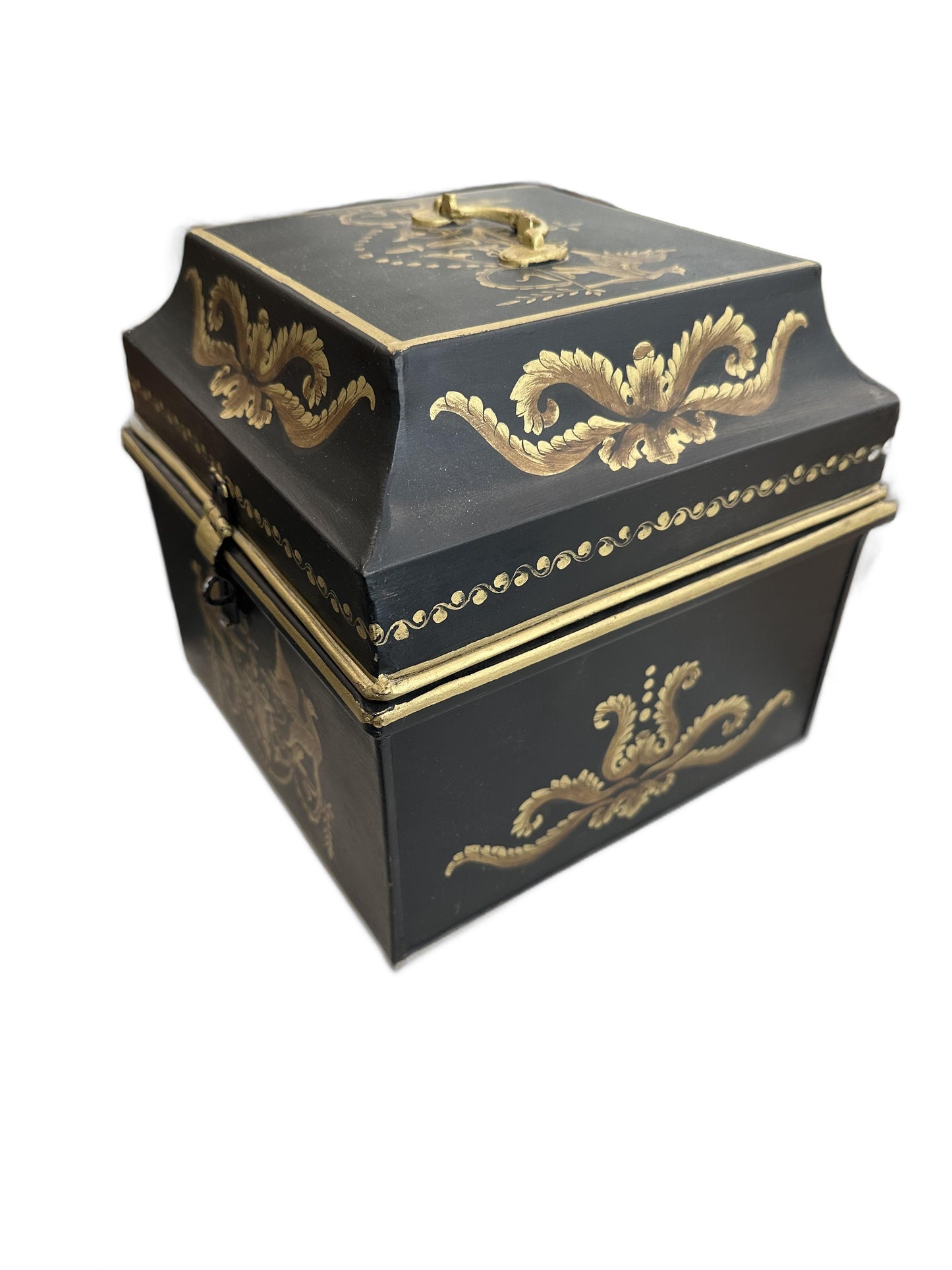 Vintage tole hinged box, angled top view of the domed lid with gilt neoclassical foliate decoration