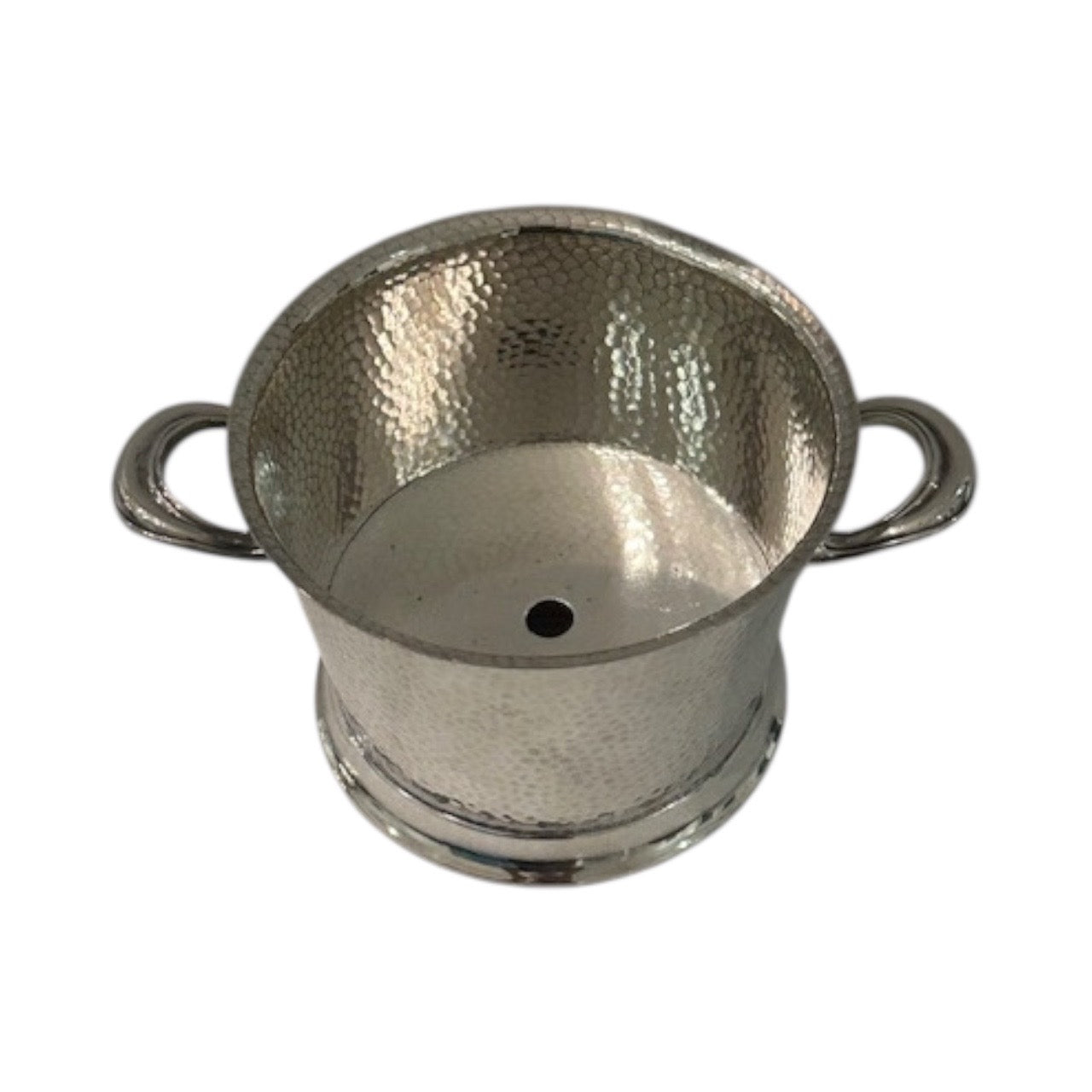 Hammered silver-plate ice bucket, view into the interior showing the drain hole in the base