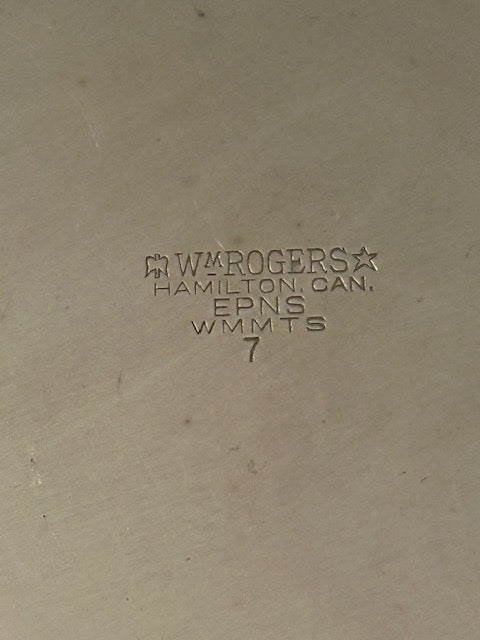 Close-up of the ice bucket's maker's mark: Wm Rogers, Hamilton, Canada, EPNS