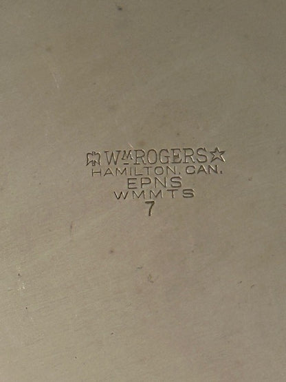 Close-up of the ice bucket's maker's mark: Wm Rogers, Hamilton, Canada, EPNS
