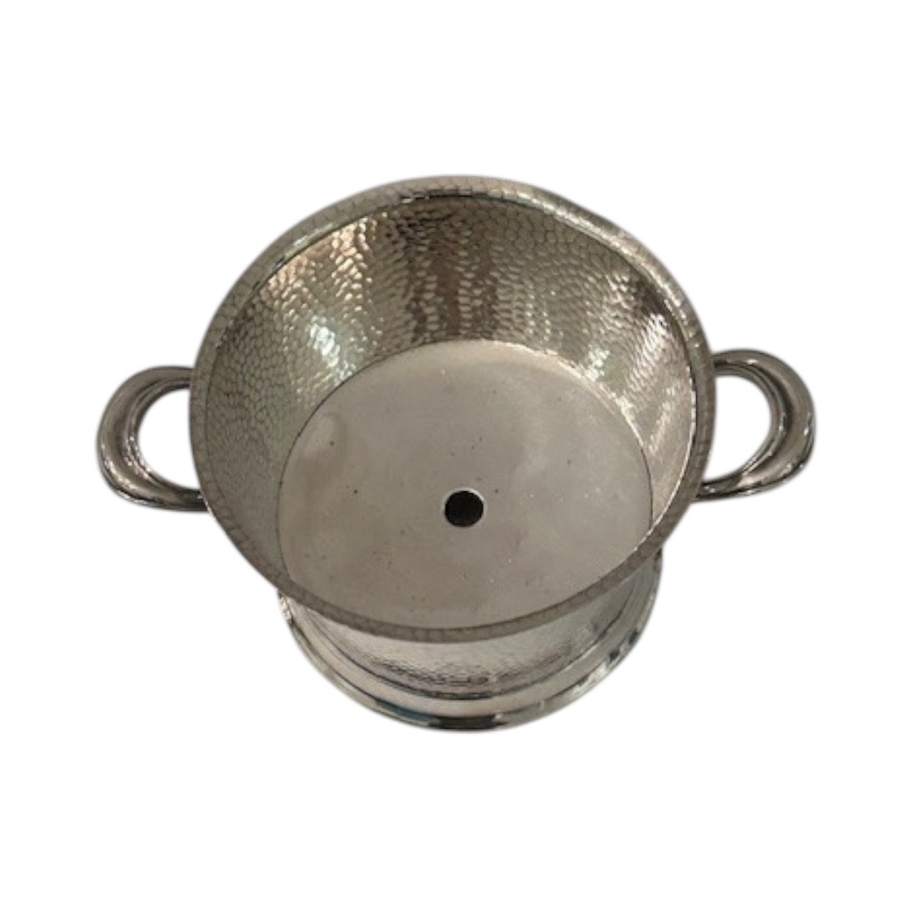 Hammered silver-plate ice bucket, top-down view into the interior with a center drain hole