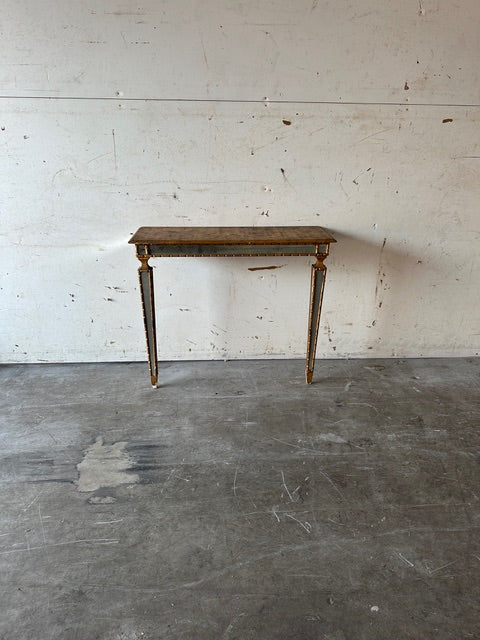 Italian pier table, front elevation against a wall, gilt wood with mirror accents