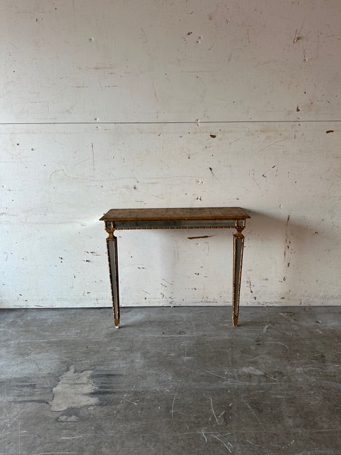 Italian pier table, straight-on front view with gilt beaded apron and mirrored legs