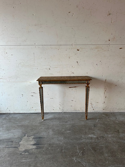 Italian pier table, straight-on front view with gilt beaded apron and mirrored legs