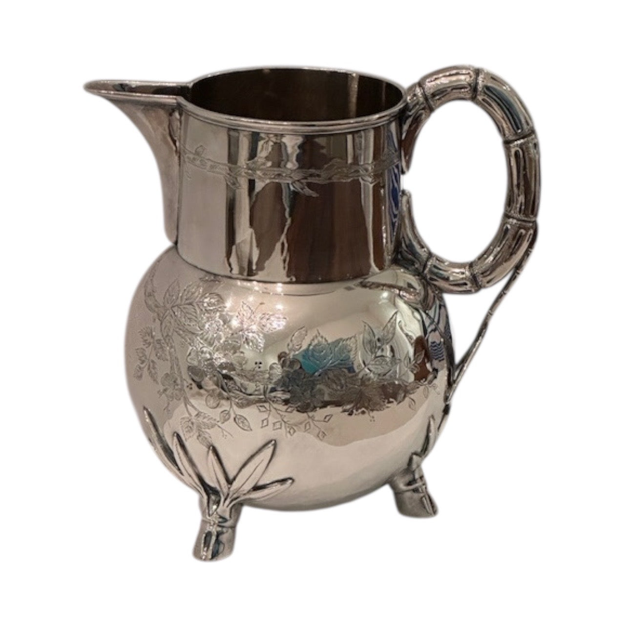 Art Nouveau silver plate pitcher, three-quarter view with bamboo-form handle and etched floral decoration